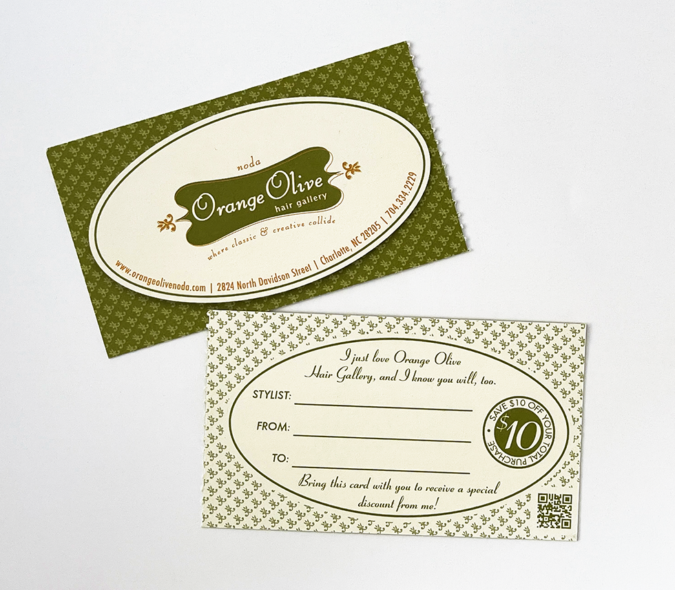 A perforated referral card printed on high quality paper stock with mostly green ink to resemble money.