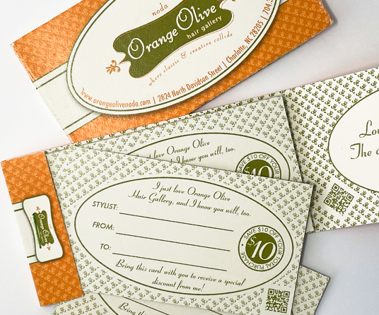 A matchbook style booklet of referral cards with ten cards per booklet, each worth a ten dollar salen credit for both referrer and referree.